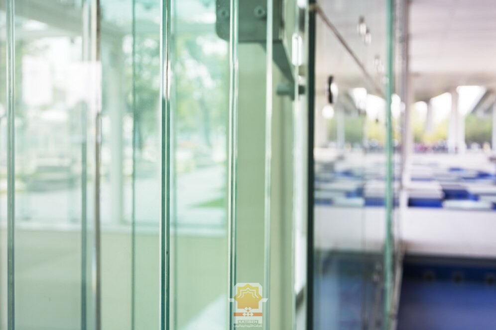 Framed and frameless glass wall